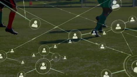 Animation-of-network-of-connections-over-football-players-practicing-on-football-field