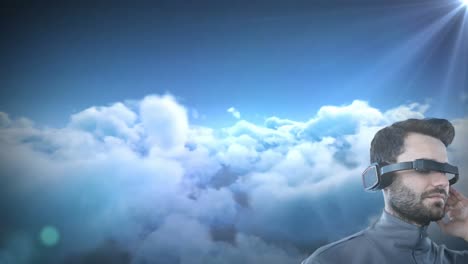 Kaukasischer-Mann-Mit-VR-Brille-Vor-Lichtfleck-Und-Wolken-Am-Himmel