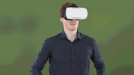 Animation-of-caucasian-man-wearing-vr-headset-over-green-background