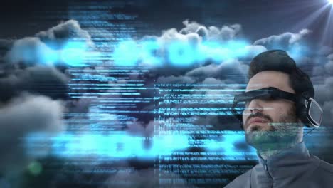 Animation-of-data-processing-over-man-wearing-vr-headset-on-sky-with-clouds