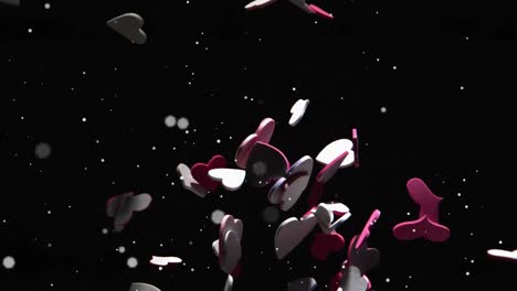Animation-of-red-and-white-hearts-falling-on-black-background-with-white-spots-of-light