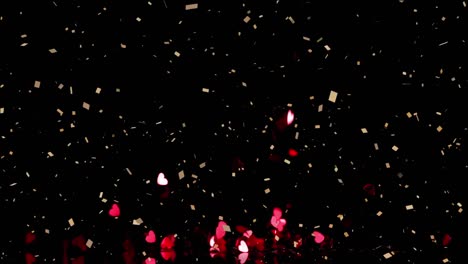 Animation-of-confetti-falling-and-red-hearts-on-black-background