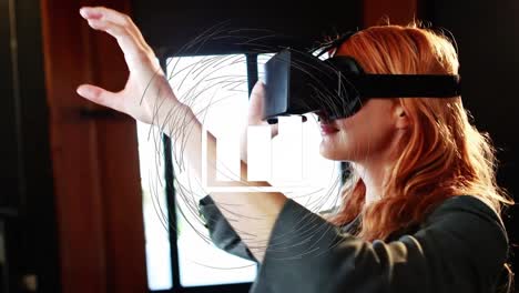 Animation-of-network-of-connections-with-statistics-over-businesswoman-wearing-vr-headset