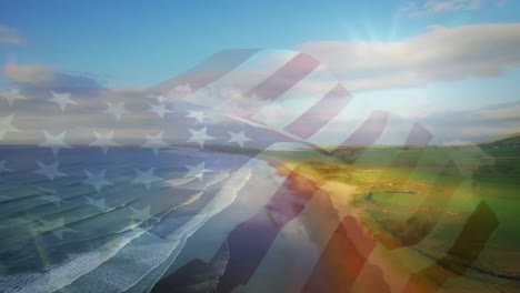 Animation-of-american-flag-waving-over-sunny-seaside