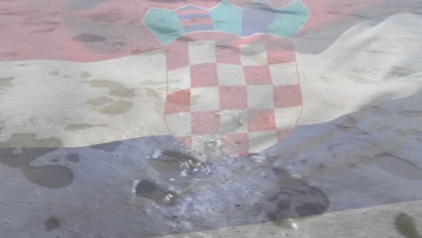 Animation-Der-Flagge-Kroatiens,-Die-über-Der-Sonne-Auf-Wellen-Weht,-Die-Im-Meer-Brechen