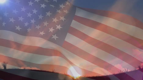 Animation-of-american-flag-over-stunning-sunset-landscape