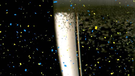 Animation-of-confetti-falling-and-glass-of-champagne-on-black-background
