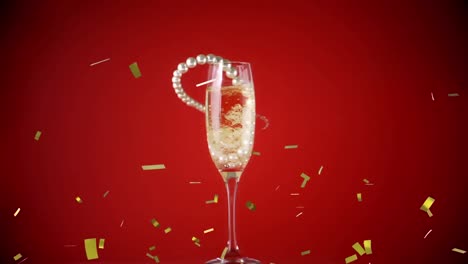 Animation-Von-Goldenem-Konfetti-Und-Perlenkette,-Die-In-Ein-Glas-Champagner-Auf-Rotem-Hintergrund-Fällt