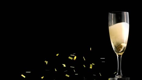 Animation-Von-Fallendem-Goldkonfetti-Und-Einem-Glas-Champagner-Auf-Schwarzem-Hintergrund