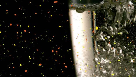 Animation-of-confetti-falling-and-champagne-being-poured-into-glass