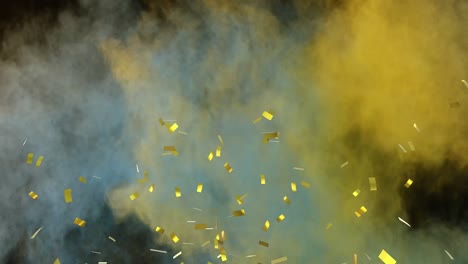 Animation-of-gold-confetti-falling,-with-yellow-and-blue-coloured-powder-on-black-background