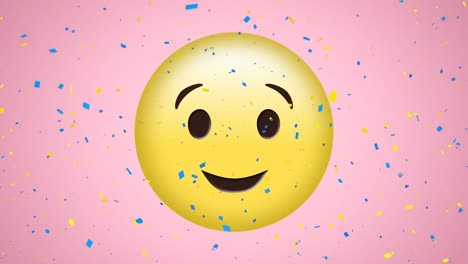 Animation-of-confetti-falling-over-happy,-winking-emoji-on-pink-background