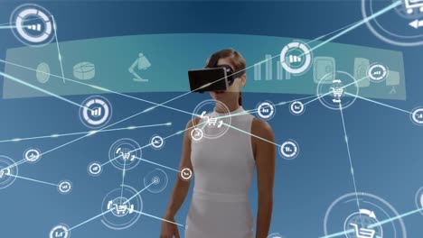 Animation-of-network-of-connections-with-icons-over-businesswoman-wearing-vr-headset
