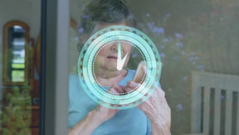 Animation-of-clock-moving-fast-over-woman-using-smartphone