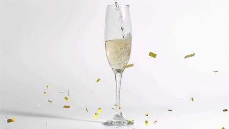 Animation-Von-Goldenem-Konfetti,-Das-über-Ein-Glas-Champagner-Auf-Weißem-Hintergrund-Fällt