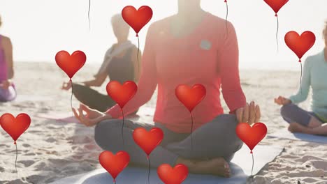 Animation-of-red-heart-balloons,-over-women-exercising-on-beach