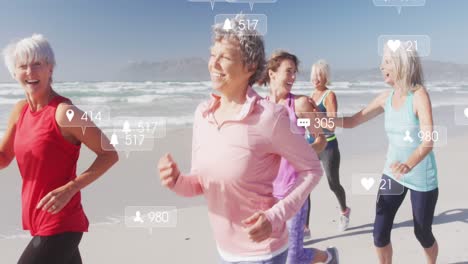Animation-of-social-media-icons-over-senior-women-running-on-beach