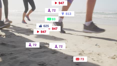 Animation-of-social-media-notifications,-over-women-running-on-beach