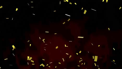 Animation-of-gold-confetti-floating-over-red-and-black-background