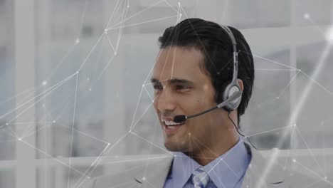 Animation-of-network-of-connections-over-businessman-using-phone-headsets