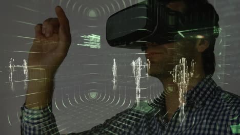 Animation-of-data-processing-over-man-wearing-vr-headset