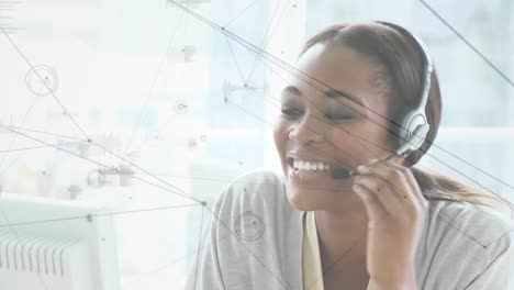 Animation-of-network-of-connections-over-businesswoman-using-phone-headset