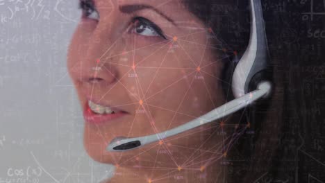 Animation-of-network-of-convection-over-businesswoman-using-phone-headsets