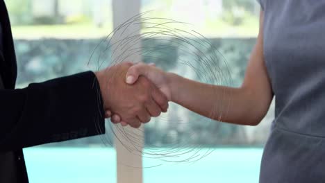 Animation-of-globe-over-businessman-handshake
