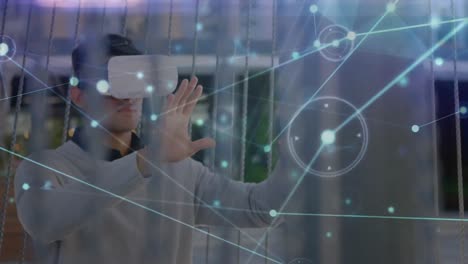 Animation-of-network-of-connections-over-man-wearing-vr-headset