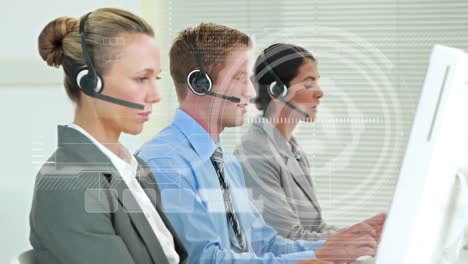 Animation-of-digital-interface-and-data-processing-over-business-people-wearing-phone-headsets
