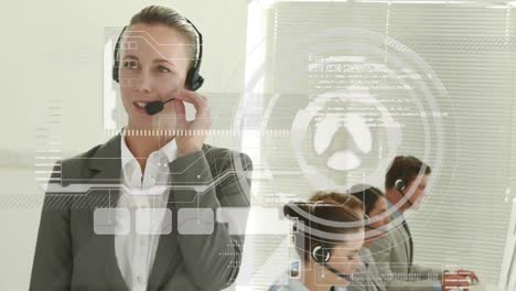 Animation-of-digital-interface-and-data-processing-over-business-people-wearing-phone-headsets