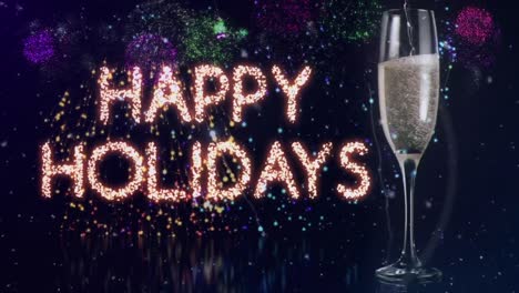 Animation-of-happy-new-year-text-greetings-over-champagne-glass-and-fireworks