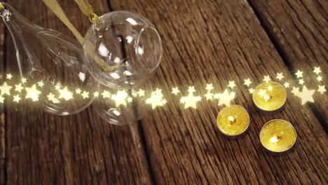 Animation-of-star-string-lights,-candles-and-christmas-decorations