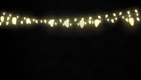 Animation-of-string-of-fairy-lights-with-copy-space-on-black-background