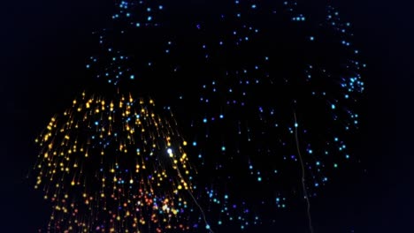 Animation-of-multi-coloured-fireworks-exploding