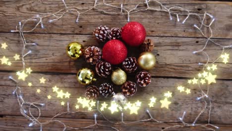 Animation-of-star-string-lights-and-christmas-tree-decorations