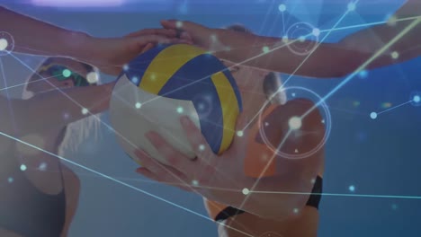 Animation-of-network-of-connections-over-women-stacking-hands-on-ball-on-beach