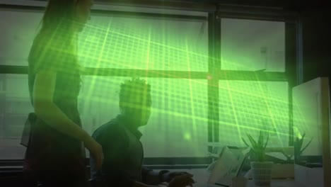 Animation-of-glowing-heart-rate-monitor-and-data-on-green-grid,-over-colleagues-talking-at-office