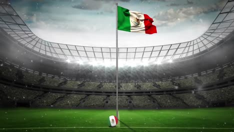 Animation-of-snow-falling-over-flag-of-mexico-at-sports-stadium