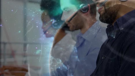 Animation-of-globe-and-network-of-connections-over-business-people-wearing-phone-headsets