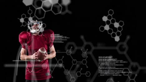 Animation-of-chemical-structures-over-male-american-football-player-holding-ball