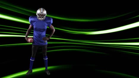 American-football-player-holding-ball-over-light-trails
