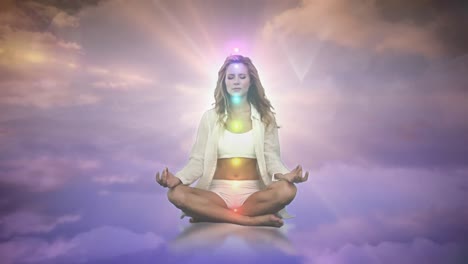 Animation-of-glowing-light-over-woman-practicing-yoga-against-clouds-and-sky