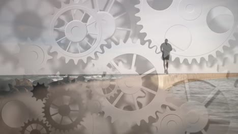 Animation-of-cogs-spinning-over-fit-man-running