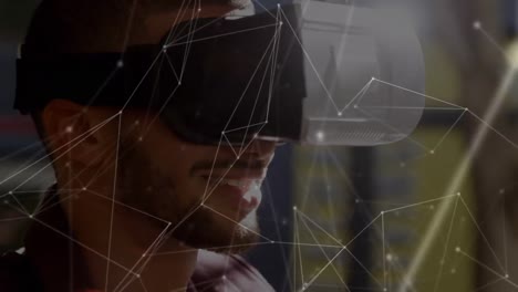 Animation-of-network-of-connections-over-businessman-using-vr-headset