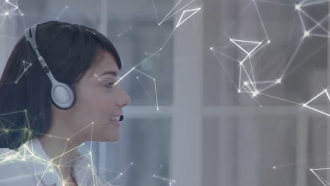 Animation-of-networks-of-connections-over-woman-wearing-phone-headset