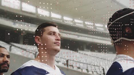 Animation-Von-Flecken-über-Männlichen-Rugbyspielern-Im-Stadion
