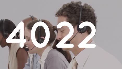 Animation-of-numbers-changing-over-people-wearing-phone-headsets