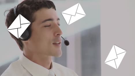 Animation-of-emails-icons-over-man-wearing-phone-headset