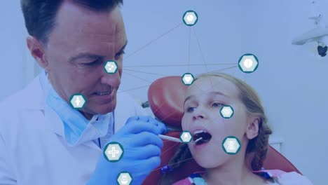 Animation-of-networks-of-connections-with-icons-over-girl-in-dentist-chair
